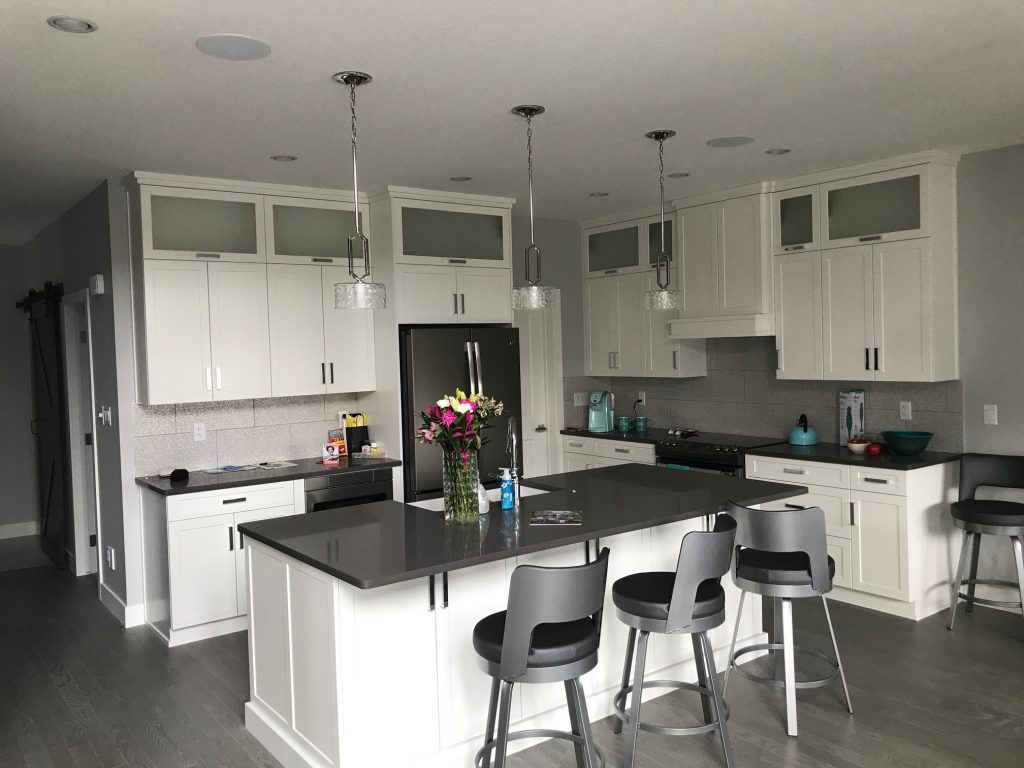 speakers and lights in the kitchen ceiling